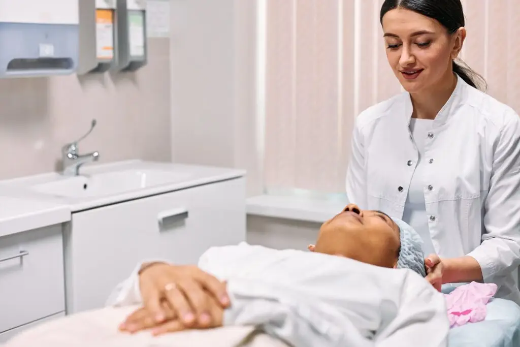 Clinician cosmetic clinic performing a treatment